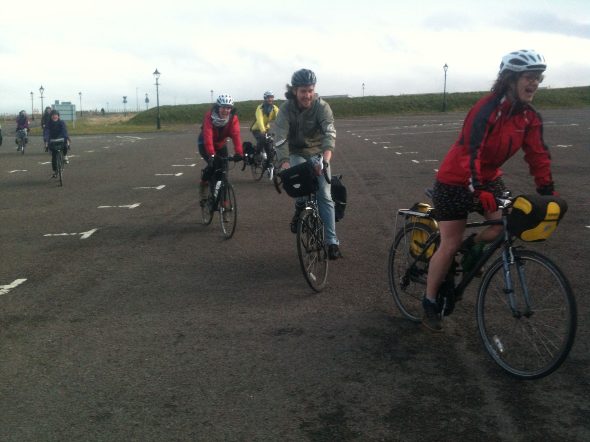 Happy People arriving at John O'Groats